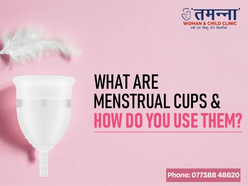 "Illustration of a menstrual cup next to a feather on a pink background with the text 'What Are Menstrual Cups & How Do You Use Them?' from Tamanna Woman & Child Clinic."